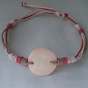 Adjustable pink and white shell bracelet